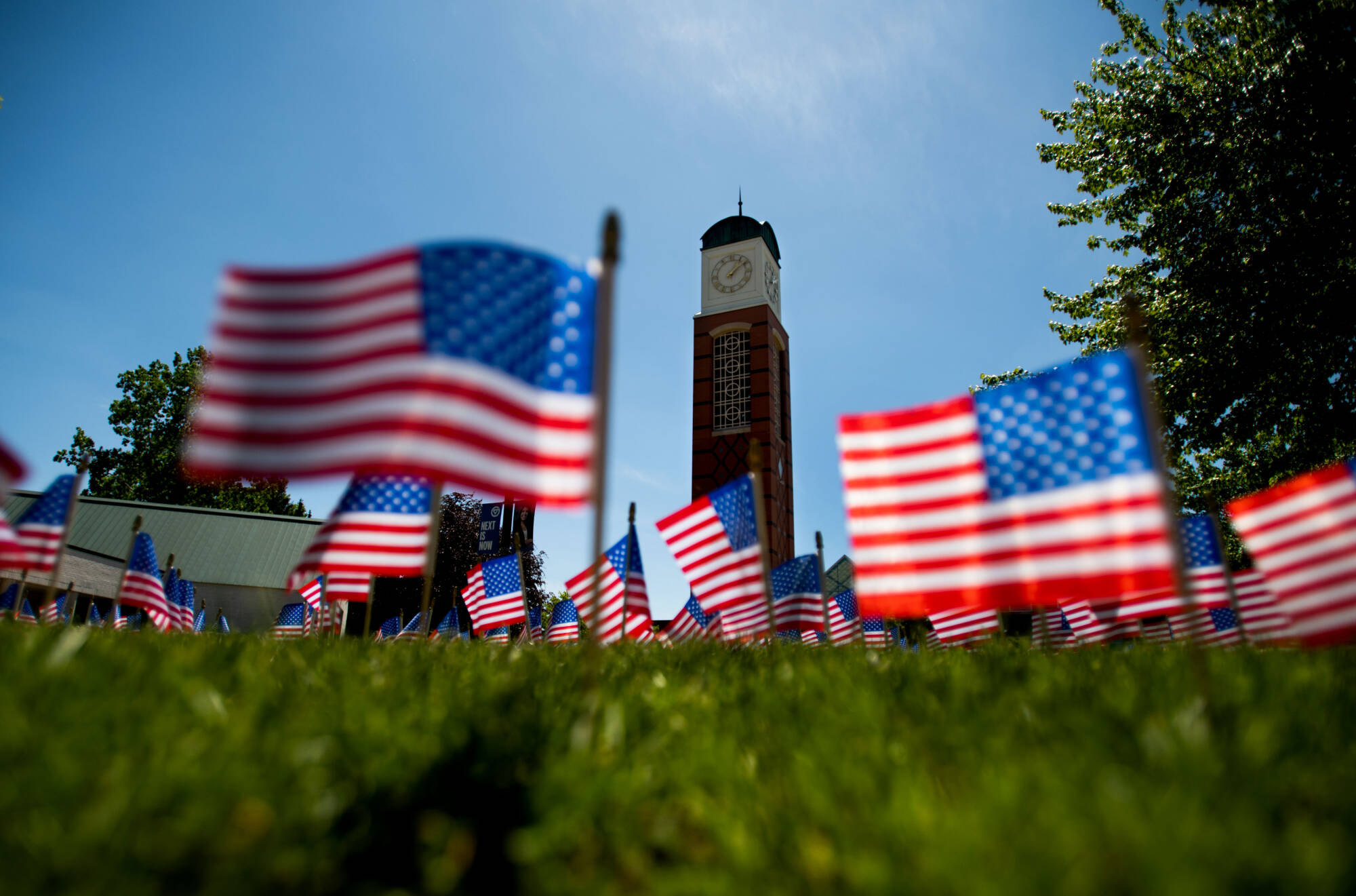 Clock tower and US flags